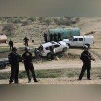 שוטרים בזירת הירי באום אל־חיראן, 2017. | AP