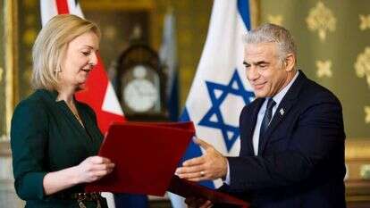 יאיר לפיד וליז טראס. קרדיט | סטיוארט מיטשל יאיר לפיד וליז טראס. קרדיט | סטיוארט מיטשל