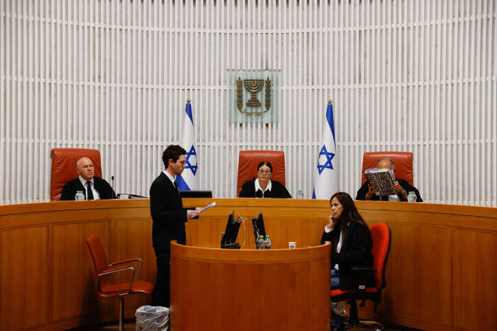 שופטי העליון חיות, סולברג ופוגלמן. | אוליבייה פיטוסי, פלאש 90