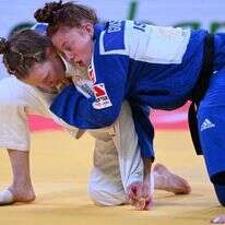 רגע אנושי וספורטיבי. גושן בקרב בטשקנט רגע לפני הניצחון. | גטי אימג'ס