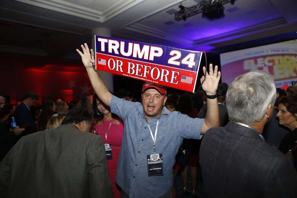 תומך טראמפ בליל בחירות האמצע בפלורידה. | AFP