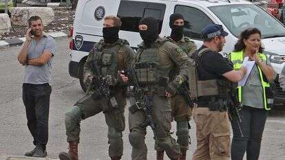 כוחות הביטחון בזירת הפיגוע באריאל, . | AFP