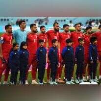 שומרים על שתיקה. שחקני נבחרת איראן בעת השמעת ההמנון של ארצם במונדיאל. | אי פי איי