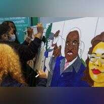 סטודנטים אמריקאיים עם תערוכת אומנות לזכר מרטין לות'ר קינג. | EPA