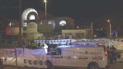 זירת הפיגוע בנווה־יעקב. | AFP