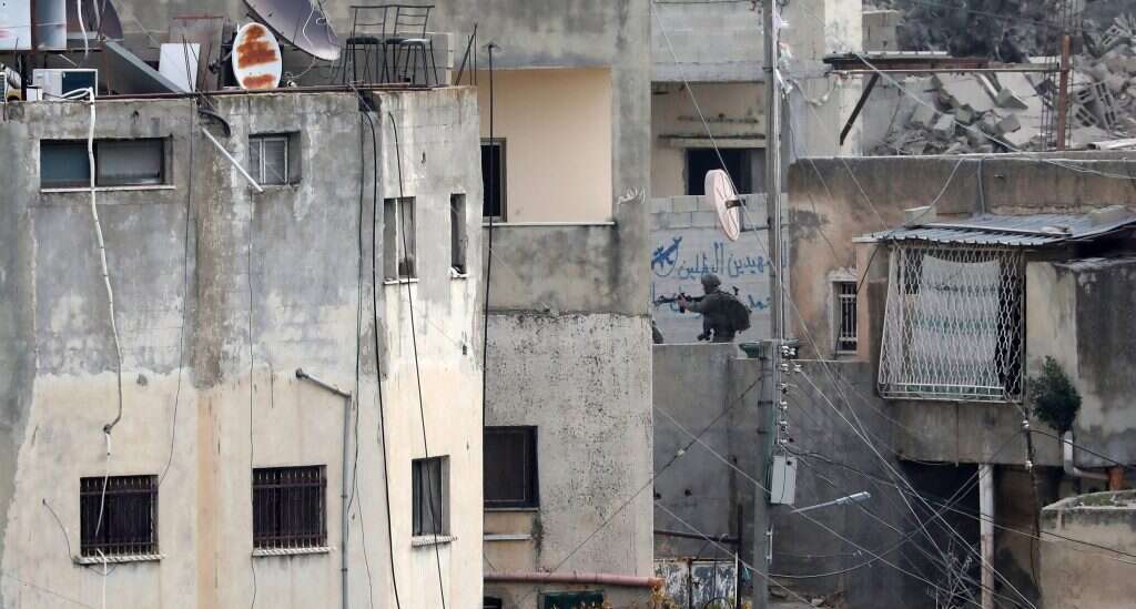 הישראלים תמיד מזוהים כתוקפנים. חייל צה"ל במבצע להריסת בתי מחבלים ליד ג'נין. | אי.פי.איי