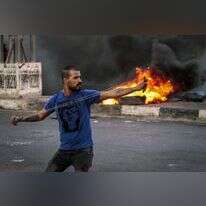 פלסטיני מתפרע בחווארה, 2021. | נאסר אישתיה, פלאש 90