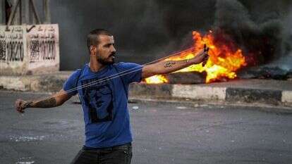 פלסטיני מתפרע בחווארה, 2021. | נאסר אישתיה, פלאש 90