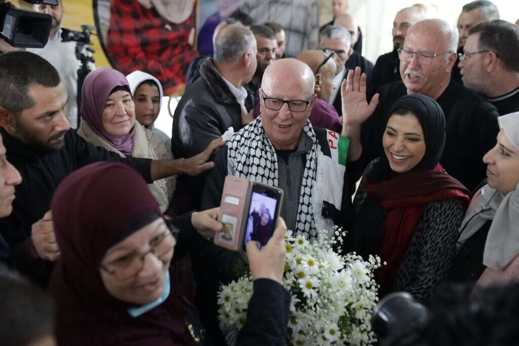 "הוא בהחלט חשש מהאפשרות של שלילת אזרחות וגירוש מהארץ". המחבל כרים יונס בחגיגות שחרורו. | גטי אימג'ס