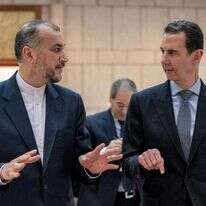 נשיא סוריה, בשאר אל-אסד, ושר החוץ האיראני, אמיר עבד אלהיאן | AFP