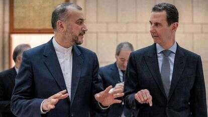 נשיא סוריה, בשאר אל-אסד, ושר החוץ האיראני, אמיר עבד אלהיאן | AFP