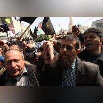 חאדר עדנאן נושא אלונקה בלווית מחבל, ארכיון. | AFP