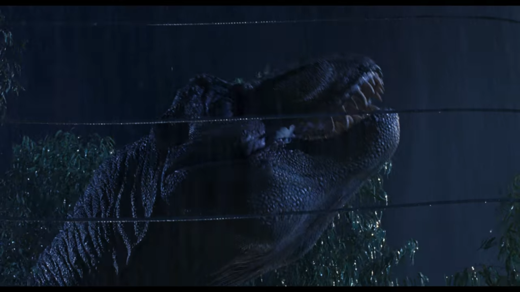 הטי-רקס מפציע ופולט שאגה איומה. | מסך