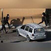 חמושים פלסטינים בג'ניו, אתמול. | EPA