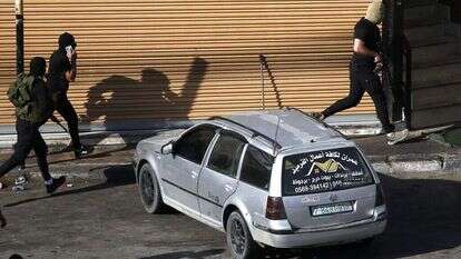 חמושים פלסטינים בג'ניו, אתמול. | EPA