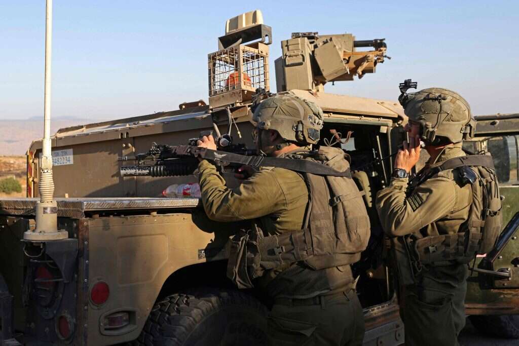 כוחות צה"ל סמוך לגבול עם לבנון. | AFP כוחות צה"ל סמוך לגבול עם לבנון. | AFP