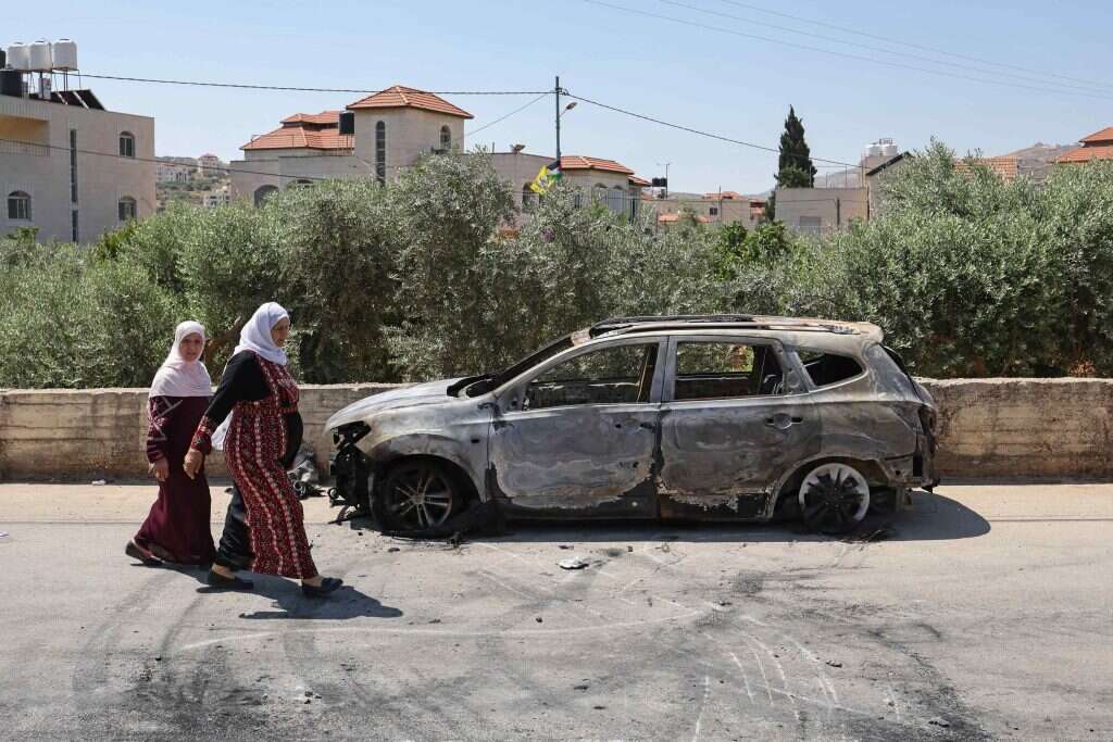 רכב שהוצת בכפר תורמוס־עייא, יוני 23'. | איי.אף.פי רכב שהוצת בכפר תורמוס־עייא, יוני 23'. | איי.אף.פי