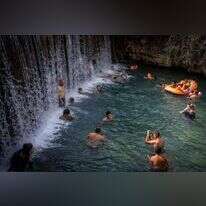 ישראלים מבלים בחופש הגדול בגן השלושה (הסחנה) שבעמק המעיינות. | יונתן זינדל - פלאש 90