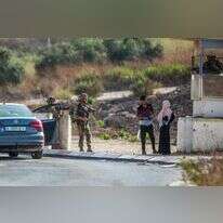 חיילי צה"ל במחסום שהקימו אחרי הפיגוע בחווארה, אתמול. | נאסר אישתייה, פלאש 90