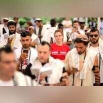 מפגינה בתל־אביב ב"יום התפילין". | תומר נויברג, פלאש 90