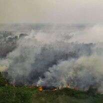 עשן משריפת ענק באינדונזיה, ארכיון. | Al ZULKIFLI / AFP