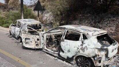 רכבים מפויחים בכניסה לשדרות. | AFP רכבים מפויחים בכניסה לשדרות. | AFP