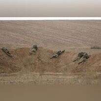 חיילים מתכוננים לכניסה קרקעית בגבול עזה. | EPA