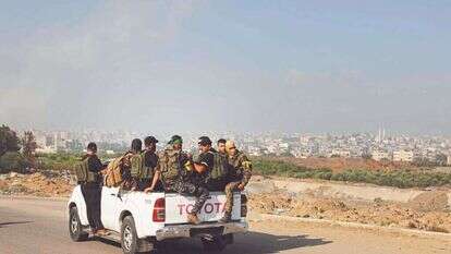 אנשי חמאס בעזה בדרך לגבול. | איי.אף.פי