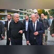 ראש הממשלה בנימין נתניהו עם קנצלר גרמניה אולף שולץ בקריה בתל אביב. | - קובי גדעון, לע"מ