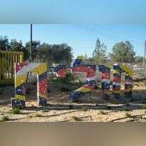 הכניסה לקיבוץ חולית, | אביעד בשארי