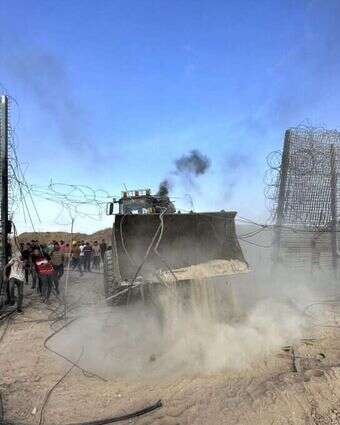 פריצת הגדר בשמחת תורה. | גטי אימג'ס