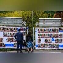 מודעות חטופים בירושלים. | AFP