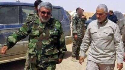 רזא מוסאווי (משמאל) עם קאסם סלימאני