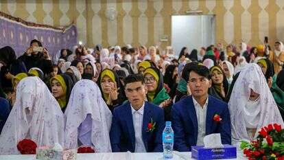 חתנים וכלות בחתונה באפגניסטן, אילוסטרציה. | סטרינגר, EPA