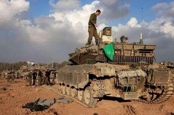 כוח שריון על גבול רצועת עזה. | AFP כוח שריון על גבול רצועת עזה. | AFP