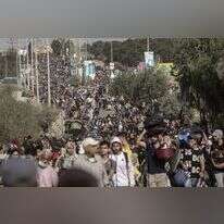 עזתים מתפנים דרומה בתחילת המלחמה | EPA