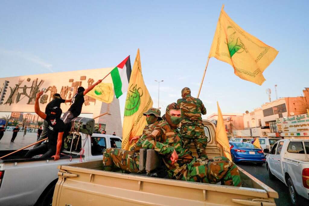גדודי חזבאללה בעיראק | AFP