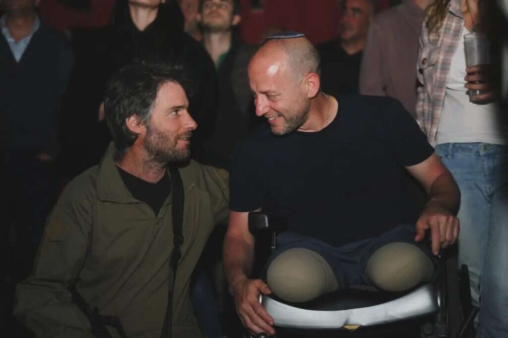 אלישע מדן (ימין) בכנס המילואימניקים, אמש. | יוסף מזרחי אלישע מדן (ימין) בכנס המילואימניקים, אמש. | יוסף מזרחי