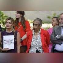 חברי ארגון DAWN מחוץ לשגרירות הסעודית בארה"ב. | Gemunu Amarasinghe, AP