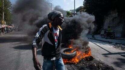 מפגינים נגד הממשלה בהאיטי. | EPA