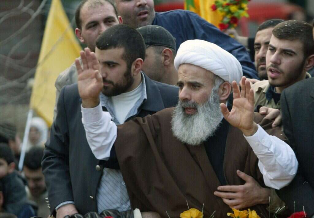 "העסקאות הללו מעודדות עוד הרג וחטיפות". שייח' עובייד מגיע לביירות לאחר שחרורו, 2004. | איי.אף.פי