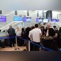 נוסעים בנמל התעופה בן גוריון. | תומר נויברג, פלאש 90