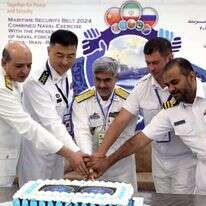 קצינים בציים של איראן, סין ורוסיה בתרגיל משותף שהתקיים במפרץ עומאן | AFP