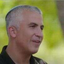 מנחם קלמנזון. | מסך