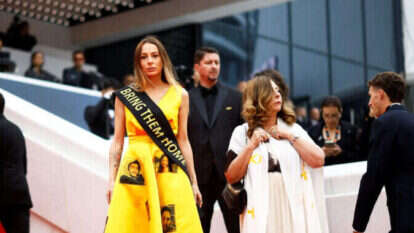 "הסתכלתי על התמונות שלהם, וזה מה שנתן לי את הכוח, את האש". על השטיח האדום בקאן. | רויטרס