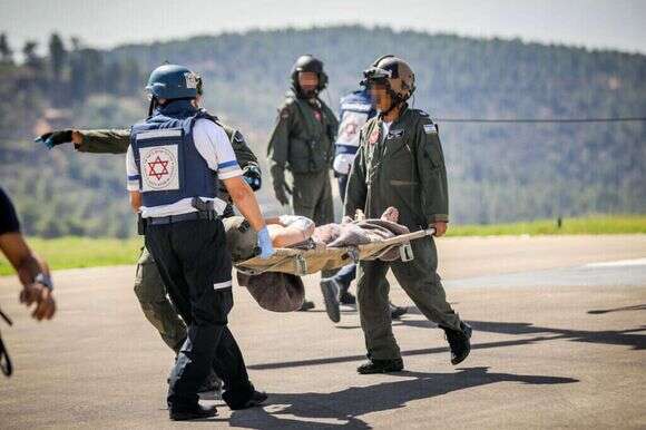 פינוי פצועים ב־7 באוקטובר. | נעם ריבקין פנטון, פלאש 90 פינוי פצועים ב־7 באוקטובר. | נעם ריבקין פנטון, פלאש 90