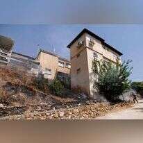 שריפות סמוך למבנים בקריית שמונה בעקבות התקפות חיזבאללה. | AFP