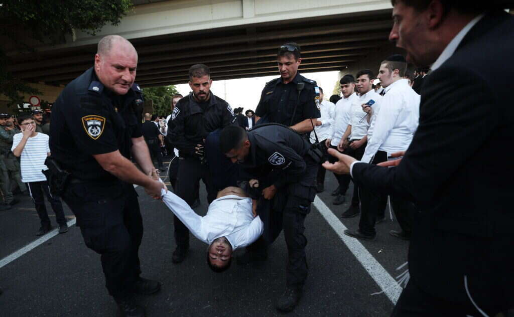 הפגנות נגד גיוס חרדים. | EPA הפגנות נגד גיוס חרדים. | EPA