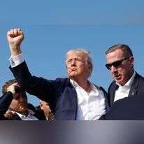 טראמפ לאחר הירי. | AFP