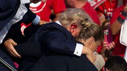 דונלד טראמפ לאחר הירי. | AFP